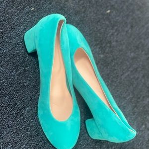 These shoes are turquoise sued  block heal